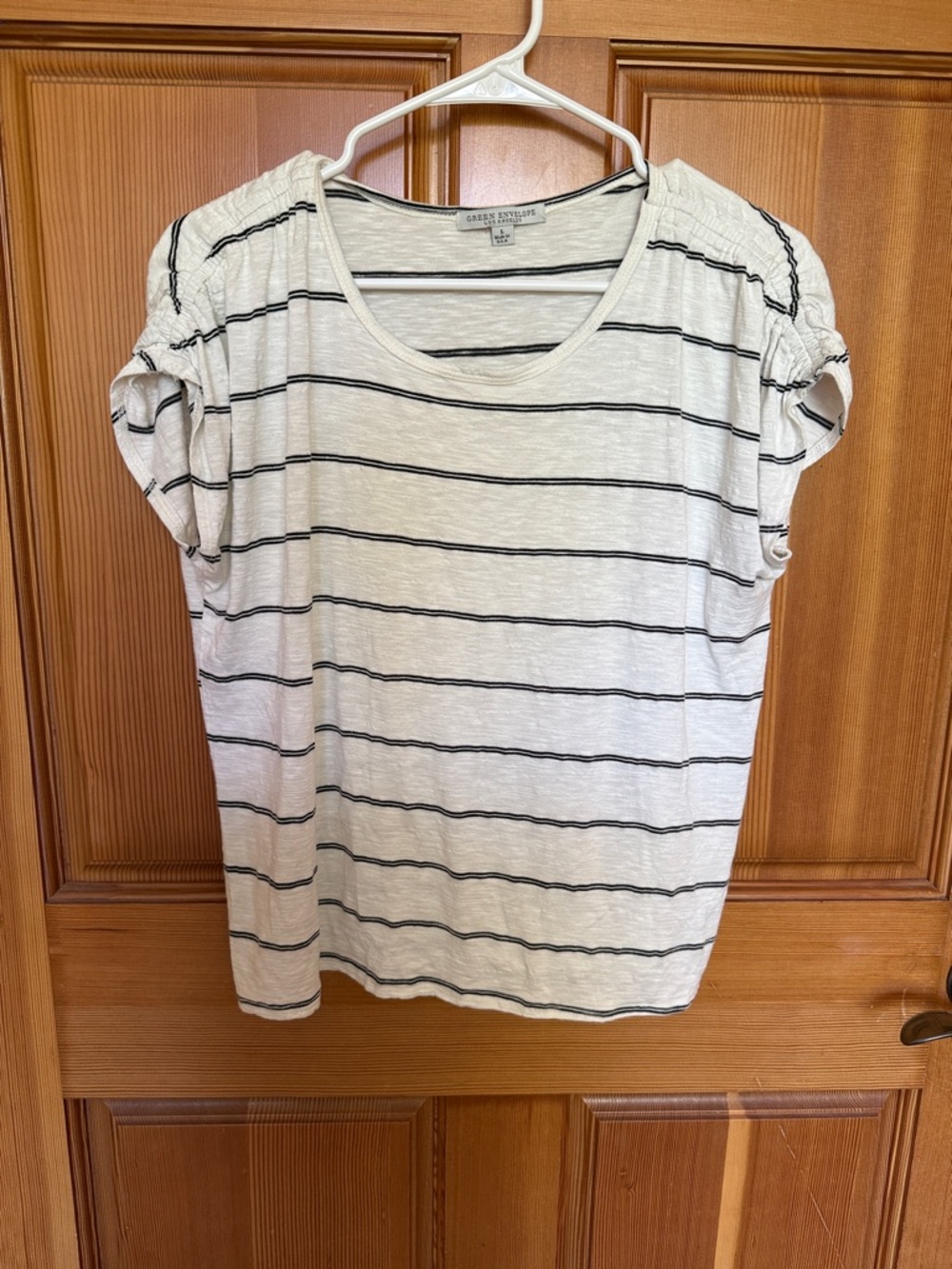 Green Envelope Women's Cream Tee with Black Stripes and Ruched Shoulders